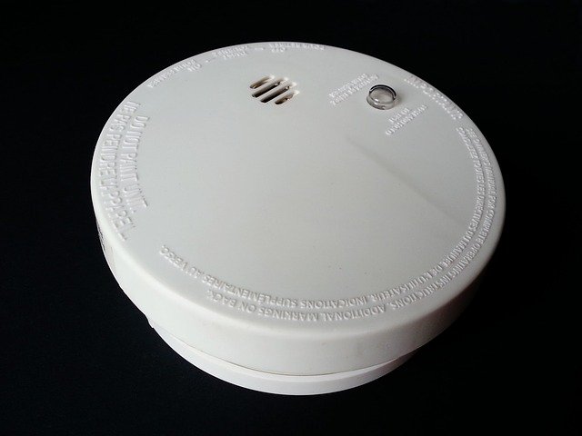 close up of white smoke detectors in rentals