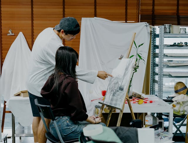 two people in an art class